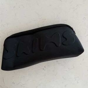 SKIMS Black Pouch